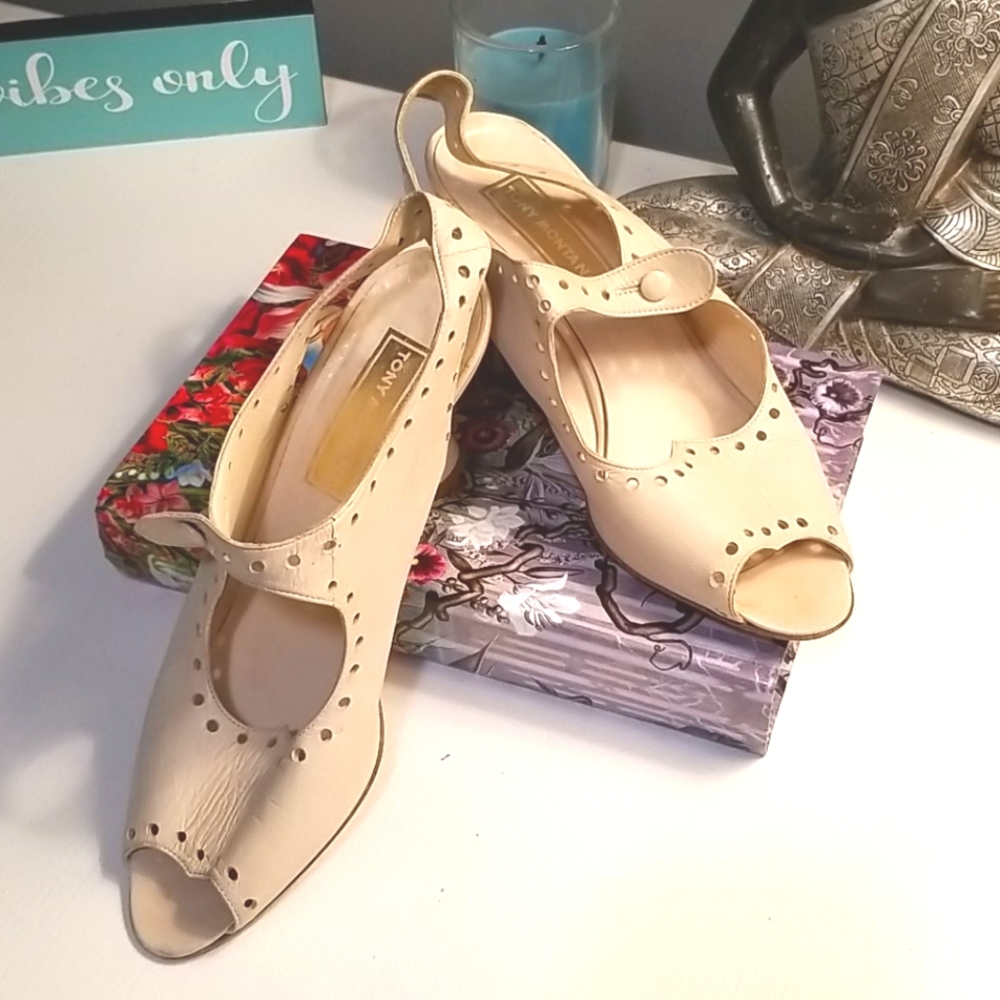 Tony Montana peeptoe sandals.